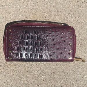 Burgundy ostrich Embossed Wallet used.